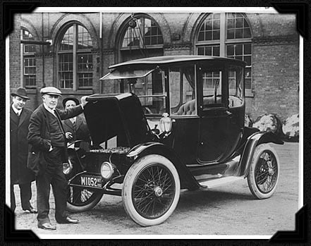 Thomas Edison next to Electric Vehicle in 1913